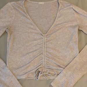 Cream adjustable top from Garage, size small, good condition